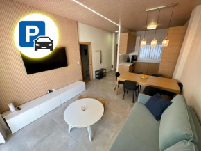 Comfortable apartment in center with private parking garage
